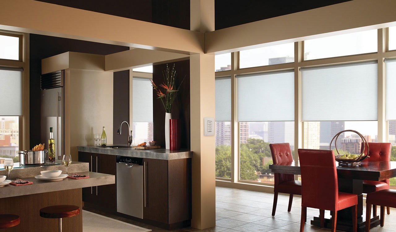Open living space with automated shades lowered against the afternoon sun