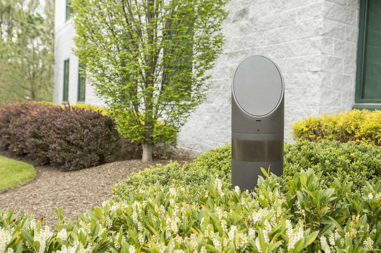 Landscape speaker blended into garden planting