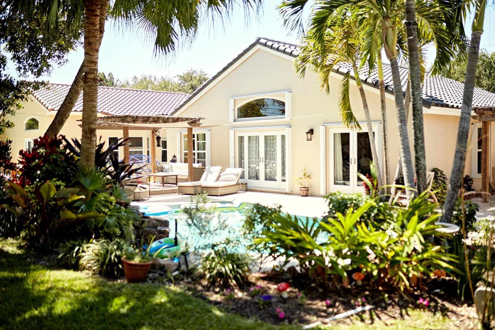 Southwest Florida backyard with pool and palm trees